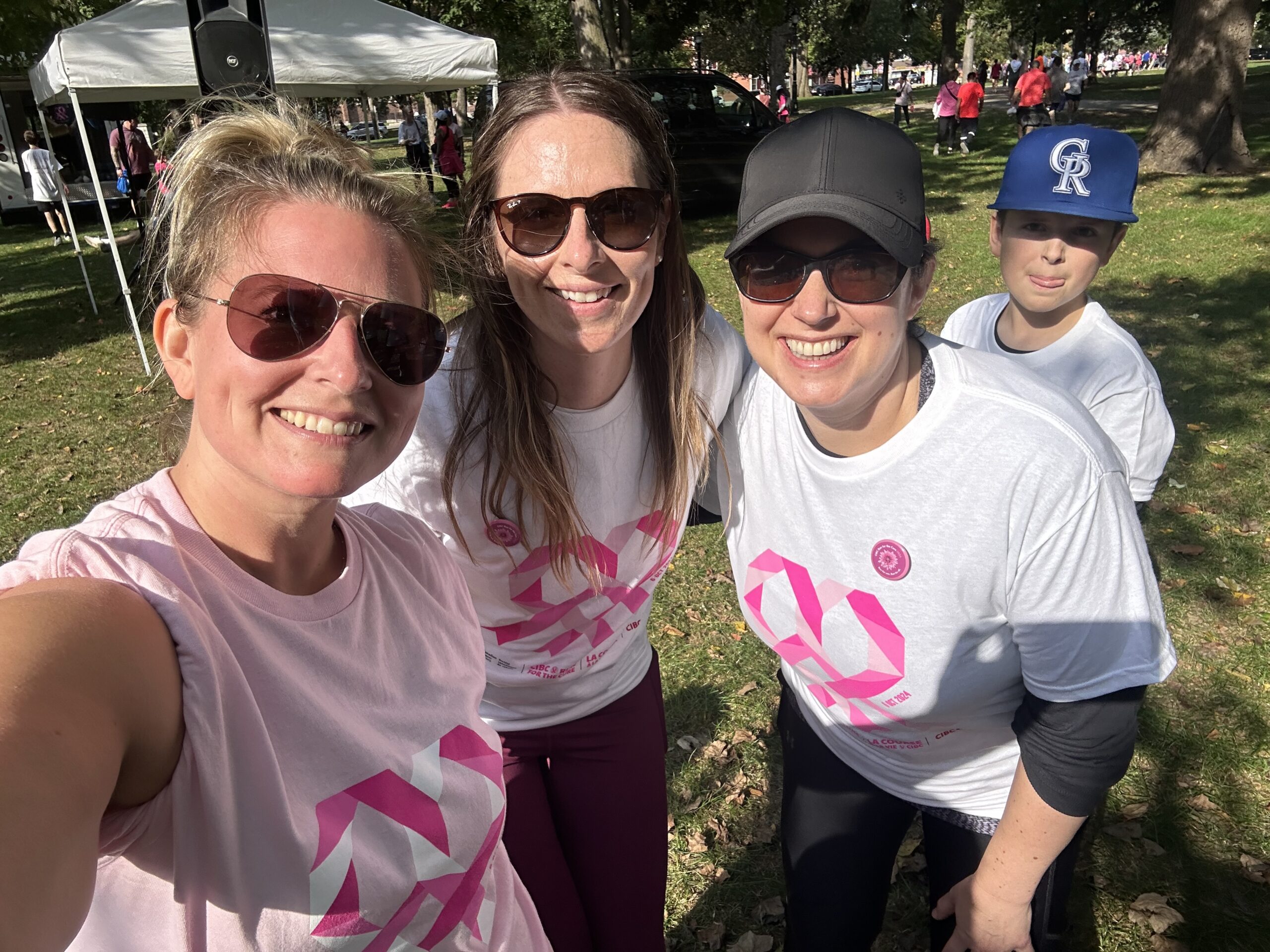 Three women taking a selfie after running.